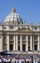 Vatican City Pope Benedict XVI under a canopy during an audience in Piazza San Pietro in front of the Basilica of Saint Peter with crowds in the squareEuropean Italia Italian Roma Southern Europe Cat...