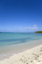 Waves breaking on Paradise Beach at LEsterre Bay with the turqoise sea and Sandy Island sand bar beyondBeaches Resort Sand Sandy Scenic Seaside Shore Tourism West Indies Caribbean Grenadian Greneda I...