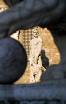 The 1533 statue of Hercules and Cacus by Bandinelli seen through the legs of a stone lion outside the Palazzo Vecchio in the Piazza della SignoriaEuropean Italia Italian Southern Europe Toscana Tusca...