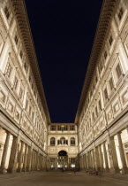 The 16th century Vasari corridor of the Uffizi at night with people sightseeingEuropean Italia Italian Southern Europe Toscana Tuscan Firenze History Holidaymakers Nite Tourism Tourist