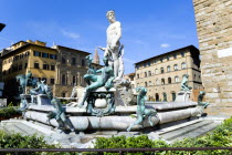 The 1575 Mannerist Neptune fountain  with the Roman sea God surrounded by water nymphs commemorating Tuscan naval victories  by Ammannatti in the Piazza della Signoria beside the Palazzo VecchioEurop...