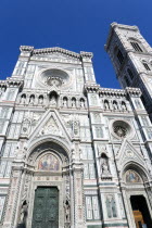 The Neo-Gothic marble west facade of the Cathedral of Santa Maria del Fiore the Duomo and Giotto s Campanile bell tower at sunsetEuropean Italia Italian Southern Europe Toscana Tuscan Firenze History...