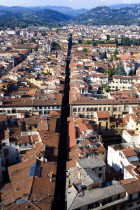 Rooftop view of the city looking down a straight road towards the northern surrounding hillsEuropean Italia Italian Southern Europe Toscana Tuscan Firenze History
