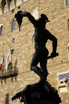 The 1554 bronze statue of Perseus holding the head of Medussa by Cellini beside the Palazzo Vecchio in the Piazza della SignoriaEuropean Italia Italian Southern Europe Toscana Tuscan Firenze History...