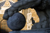 The 1533 statue of Hercules and Cacus by Bandinelli seen through the legs of a stone lion outside the Palazzo Vecchio in the Piazza della SignoriaEuropean Italia Italian Southern Europe Toscana Tusca...