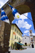 Blue and White flags of the Canneti Quartieri or quarter in the Porta Nuova or New Gate with red and white flags of the Castello Quartier decorating the Bar Centrale in the main square leading to the...