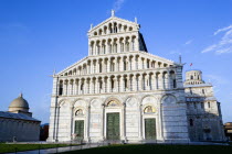 The Campo dei Miracoli or Field of Miracles.The Lombard style 12th Century facade of the Duomo Cathedral with under a blue skyEuropean Italia Italian Southern Europe Toscana Tuscan History Holidaymak...