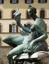 Detail of the 1575 Mannerist Neptune fountain with the Roman sea God surrounded by water nymphs commemorating Tuscan naval victories by Ammannatti in the Piazza della Signoria beside the Palazzo Vecch...