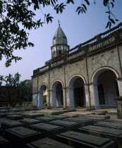 Armenian church of Holy Resurrection and rows of identical graves Asia Asian Bangladeshi Dacca Religion Religious Asia Asian Bangladeshi Dacca Religion Religious