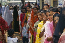 Crowd of women waiting in line at polling station to vote in local elections.Dacca Asia Asian Bangladeshi Female Woman Girl Lady Dacca Asia Asian Bangladeshi Female Woman Girl Lady