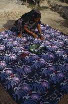Bengali woman making traditional quilt.Asia Asian Bangladeshi Classic Classical Female Women Girl Lady Historical Older One individual Solo Lone Solitary Asia Asian Bangladeshi Classic Classical Fem...