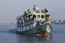 Steamer ferry on river  crowded with passengers.Asia Asian Bangladeshi Dacca  Asia Asian Bangladeshi Dacca