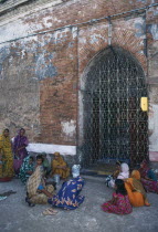 Women and children worship at Islamic shrine.Asia Asian Bangladeshi Dacca Female Woman Girl Lady Kids Religion Religious Female Women Girl Lady Asia Asian Bangladeshi Dacca Female Woman Girl Lady Ki...