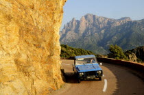 Golden rock face with coastal road & car  near PortoAutomobile Automotive Cars Motorcar Oporto Automobiles Automvil Autos French Western Europe European Automobile Automotive Cars Motorcar Oporto A...