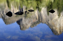 Reflection in Merced River of mountains  Valley floorNorth America Reflexion United States of America American National Park Northern The Golden State North America Reflexion United States of Americ...
