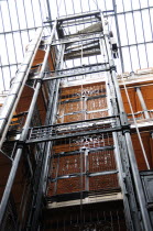 Interior of Bradbury Building  used as a set for the Blade Runner movie. Cast iron elevator.Downtown American Destination Destinations North America Northern United States of America The Golden State