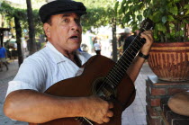 Mexican guitarist  Olvera Street.Downtown American Destination Destinations North America Northern United States of America LA One individual Solo Lone Solitary The Golden State