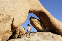 Arch Rock  Joshua Tree National ParkJTPS American Destination Destinations North America Northern United States of America Holidaymakers One individual Solo Lone Solitary Scenic The Golden State Tour...