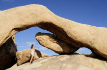 Arch Rock  Joshua Tree National ParkJTPS American Destination Destinations North America Northern United States of America Holidaymakers One individual Solo Lone Solitary Scenic The Golden State Tour...