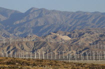 Windmills & mountains of Morongo Valley  San Gorgonio Pass  Palm Springs. Wind turbine electricty generators.JTPS American Destination Destinations North America Northern United States of America Eco...