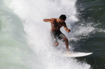 Surfer riding wave  Venice BeachVenice Beach American Beaches Destination Destinations North America Northern Resort Sand Sandy Seaside Shore Tourism United States of America LA One individual Solo L...