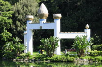 View across lake to Golden Lotus Archway  Self Realization Lake Shrine  Pacific PalisadesWest American Destination Destinations North America Northern United States of America Religion The Golden Sta...