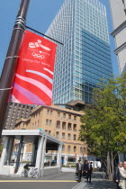 Marunouchi - by Tokyo station  banner on light pole supporting Tokyos 2016 Olympic bid  men in suits walking to workAsia Asian Japanese Nihon Nippon Male Man Guy