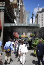 Broadway with people walking along the sidewalk outside the entrance to Macys department store.American CityDestinationTravelNorth AmericanCityscapeUrbanArchitectureNorth AmericDestination Des...