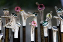 Findon village Sheep Fair Display of bone handled walking sticks with fly fishing hooks set into acrylic on the handles.Great Britain Northern Europe UK United Kingdom British Isles European