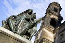 Bronze statue of a woman and winged angels on the Bruhl Terrace beside the tower of the Neues Standehaus.Destination Destinations Deutschland European Sachsen Western Europe Saxony Female Women Girl...