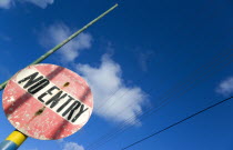 Colourful and weather worn No Entry road sign in Clifton.Caribbean West Indies Windward Islands Colorful Destination Destinations Ecology Entorno Environmental Environnement Green Issues Signs Displa...