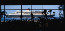 The Queen Mary 2 ship seen through the glass windows of the Cruise Ship Terminal.Caribbean Destination Destinations Grenadian Greneda West Indies Grenada Two