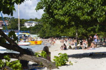 Crowds of tourists from cruise ships on BBC Beach in Morne Rouge Bay.Caribbean Destination Destinations Grenadian Greneda West Indies Grenada Ecology Entorno Environmental Environnement Green Issues...
