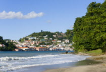 The hillside buildings and waterfront of the Carenage in the capital St Georges seen from Pandy Beach beside Port Louis Marina.Caribbean Destination Destinations Grenadian Greneda West Indies Grenada...