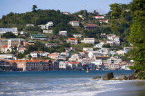 The hillside buildings and waterfront of the Carenage in the capital St Georges seen from Pandy Beach beside Port Louis Marina.Caribbean Destination Destinations Grenadian Greneda West Indies Grenada...