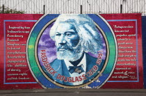 West  Falls Road  Political murals painted on walls of the Lower Falls Road area depicting Frederick Douglass who championed the abolition of slaveryPoliticalNorthernBeal FeirsteUrbanArchitecture...