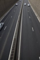 View over empty carriageways on the Westlink underpass in Belfast.Northern Beal Feirste European Irish Northern Europe Republic Ireland Poblacht na hireann Eire Automobiles Autos Gray Poblacht na hE...