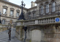 Custom House Square  Bronze statue of The Speaker on the steps. The site was originally used as a Speakers Corner.Public ArtArtUrbanBeal FeirsteArchitectureNorthernSculptureNorthern Beal Feirst...