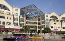 Shopping Centre with Hippo cruise boats in the foreground.Asian Blue Center Destination Destinations Singaporean Singapura Southeast Asia Southern Xinjiapo