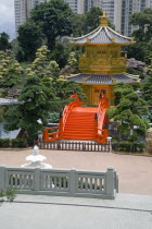 Wong Tai Sin Lian Gardens  Diamond Hill. Tang Dynasty Style Chinese Golden Temple With Red Wooden Bridge Known As Pavilion Of Absolute Perfection Lotus Pond At Nan Lian Garden shoot from above.PondL...