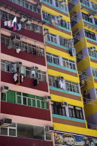 Freshly painted colored block of flats  typical workers home with hanged laundry and air condition units outside of the apartments windows.UrbanLandscapeContemporaryTourismHolidaysSummerDesign...