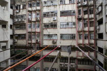 Tsim Sha Tsui  Nathan Road. Postwar apartments in bad condition with noticeable the colored sticks that Chinese are using for drying clothes.Block of flatsResidenciesBuildingStructureArchitecture...