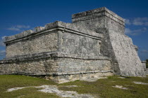 General Aspect of Tulum archeological site on a bright sunny day wirth blue sky and white clouds.MayanToltecHistorySunVacationHolidaysTravelArcheologyHistoricalReligionBuildingStructureAr...