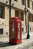 A red telephone box.Oxford telephone box call booth typical iconic English British UK phone red British Isles European Great Britain History Historic Northern Europe United Kingdom