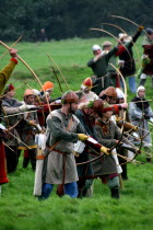 Saxon Archers at the reenactment of the 1066 Battle of Hastings.Saxon  Archers  Battle of Hastings  1066  eleventh century  11th  William the conqueror  King Harold  medieval  archer  firing  loading...