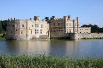 Leeds Castle viewed across moat lake.Maidstone  Leeds Castle  Kent  River Len  English  UK  England  Great Britain  British  castles  beautiful  scenic  scenery  picturesque  Norman  strong hold  Eur...