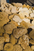 Baskets of sponges for sale in bazaar area.  Close cropped view  filling frame. Turkish Aegean coastmediterraneanresortformerly HalicarnassusHalikarnasregion of CariaDorian Greek occupiedsuns...