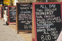 Road to Hisaronu cafe A-boards advertising full English breakfast menu with Turkish Lira price  also advertising for  televised sport.Fethiyeformerly Telmessosformerly modern Greek MakriAegeanTur...