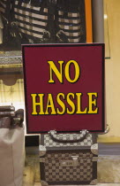 Sign reading No Hassle on shop display of luggage.TurkishAegeancoastresortsummersunshineearly summer seasonMediterraneanholidayDestination Destinations Ellada European Southern Europe Middl...