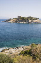 Guvercin Ada or Pigeon Island  the Kusadasi peninsula accessed by causeway. TurkishAegeancoastresortSummersunshineearly Summer seasonholidaydestinationdestinations ElladaEuropeanSouthern E...